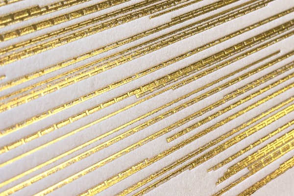 Gold foil and embossed texture on pink card